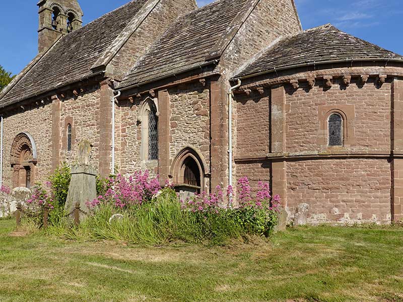 The parish church at Kilpeck in Herefordshire, with John McNeill
