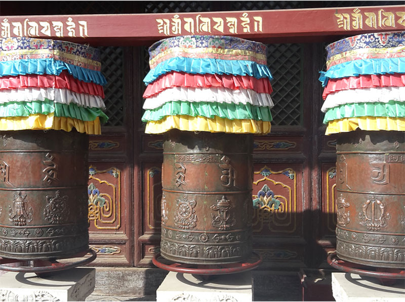 Prayer wheels at Pusading Temple.